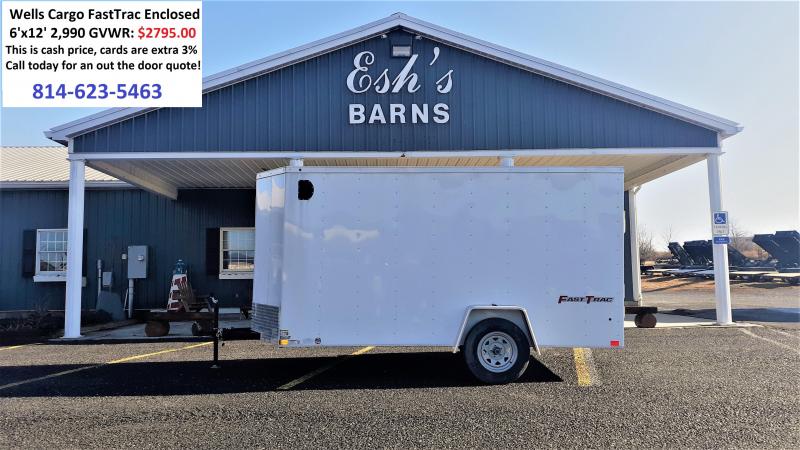 Wells Cargo FastTrac Single Axle Enclosed 6x12 2,990 GVWR -Ramp Door -V-Nose -White Color -32" Side Door -6' Inside Height -1-3.5K No Brake Axle- 15" Radial Tires Wells Cargo FastTrac Single Axle Enclosed 6x12 2,990 GVWR -Ramp Door -V-Nose -White Color -32" Side Door -6' Inside Height -1-3.5K No Brake Axle- 15" Radial Tires