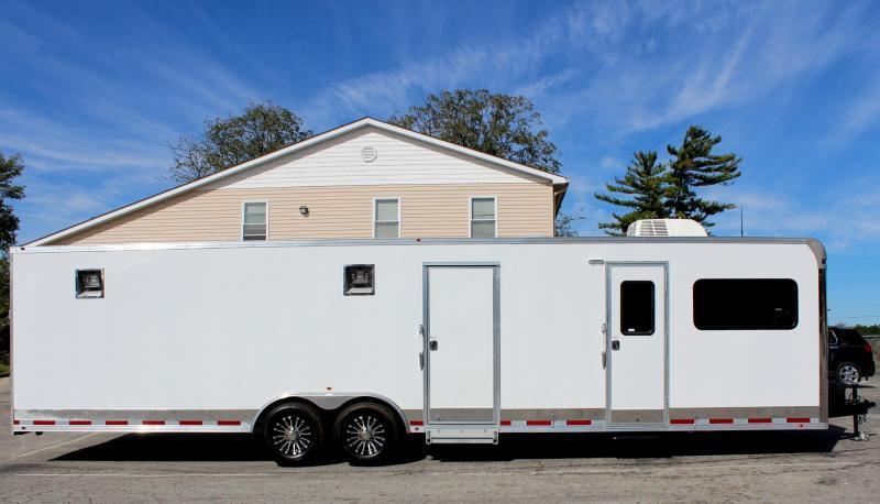 <b>Reduced Save $5207 OFF MSRP</b> White 2019 Millennium 32' 12'XE Living Quarters 20' Cargo Area <b>Reduced Save $5207 OFF MSRP</b> White 2019 Millennium 32' 12'XE Living Quarters 20' Cargo Area