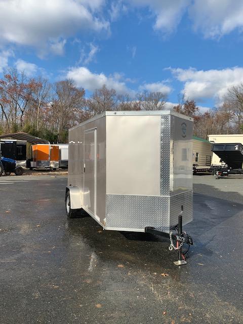 Diamond Cargo 6' x 12' Beige Enclosed Trailer w/ Ramp Diamond Cargo 6' x 12' Beige Enclosed Trailer w/ Ramp